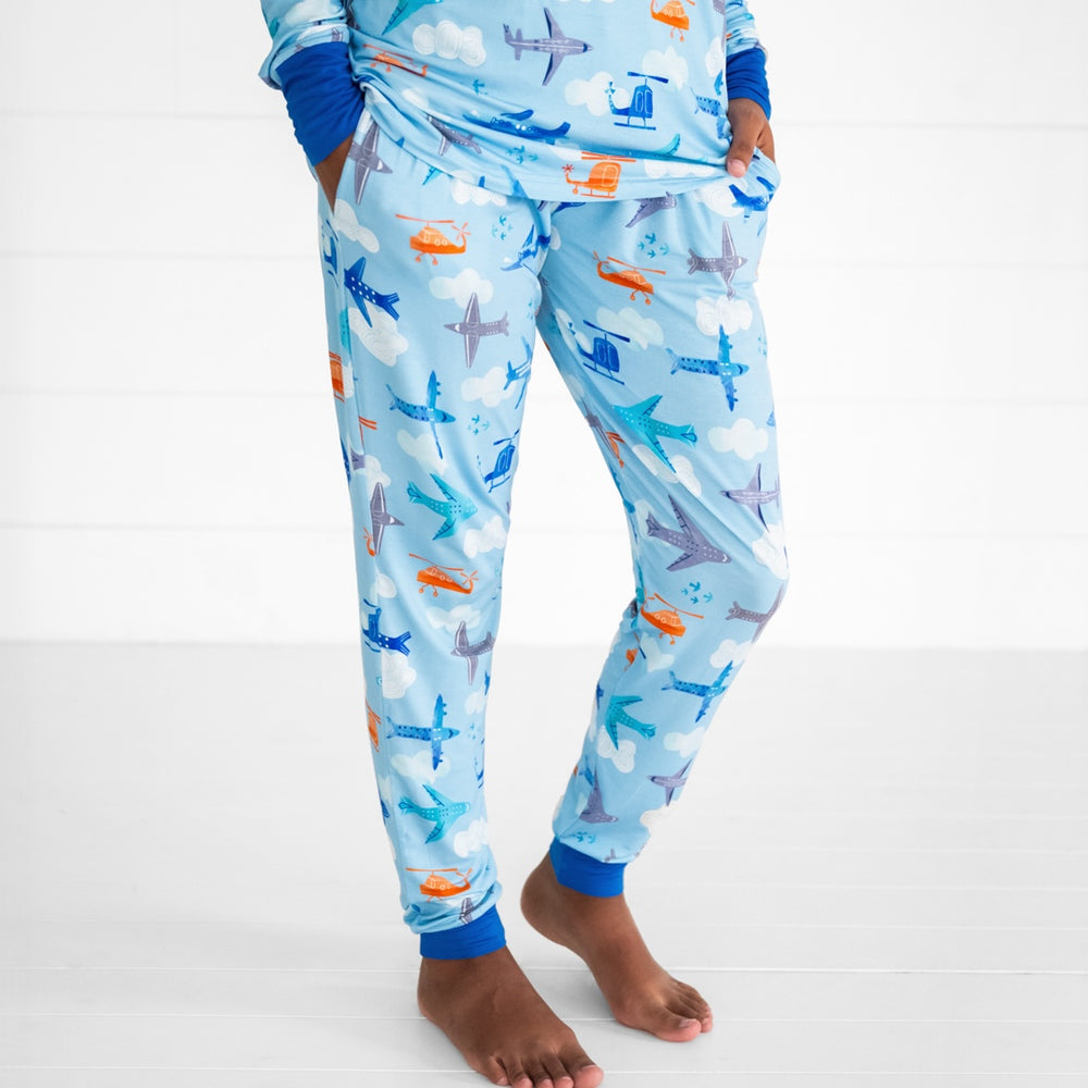 Close up image of a woman wearing Let's Fly women's pj pants