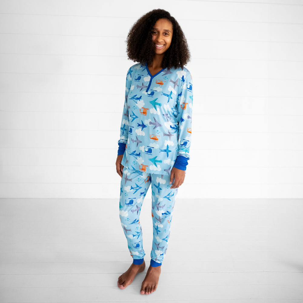 image of a woman wearing Let's Fly women's pj top and pj pants