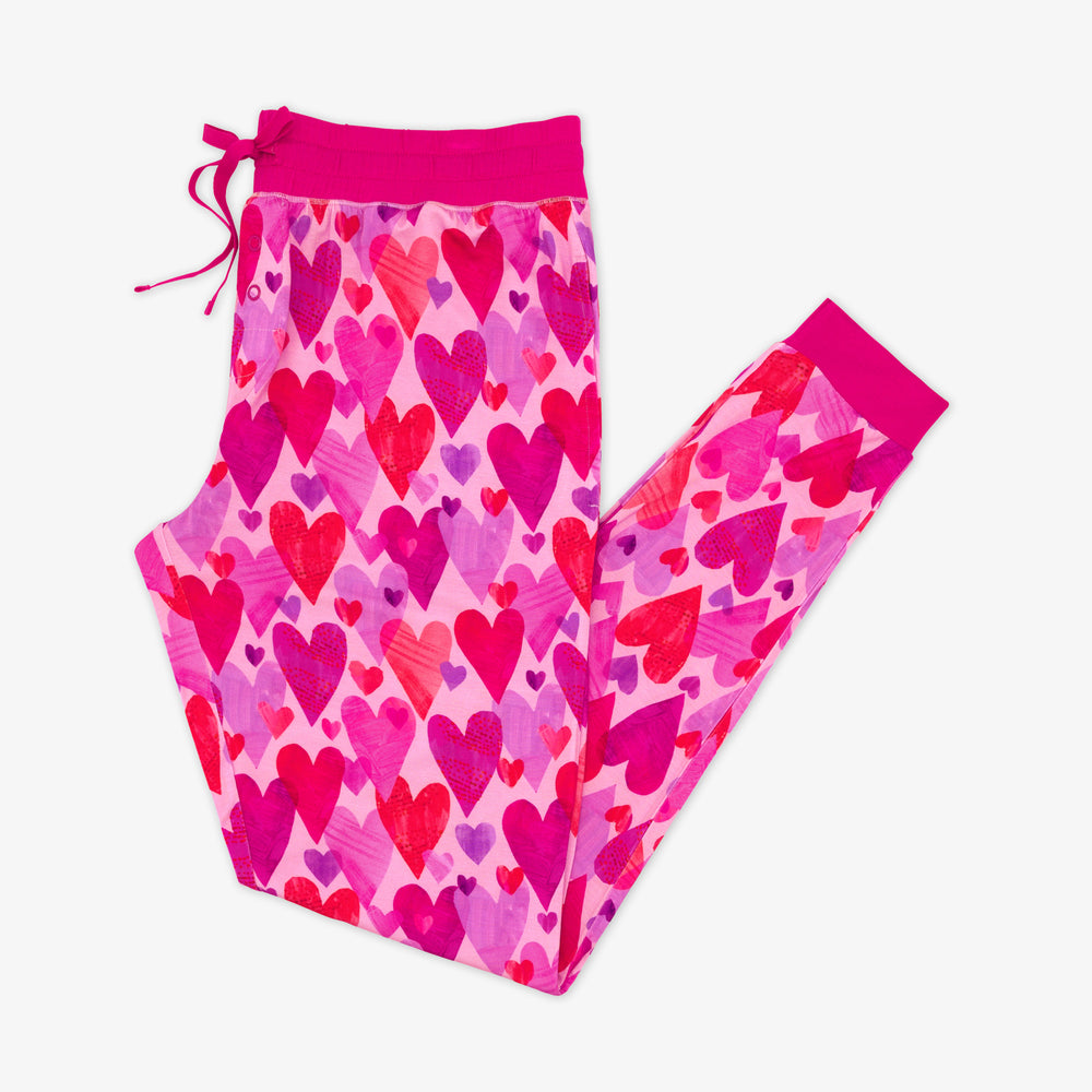 Flat lay of Pink Hearts & Crafts Women's Pajama Pants.