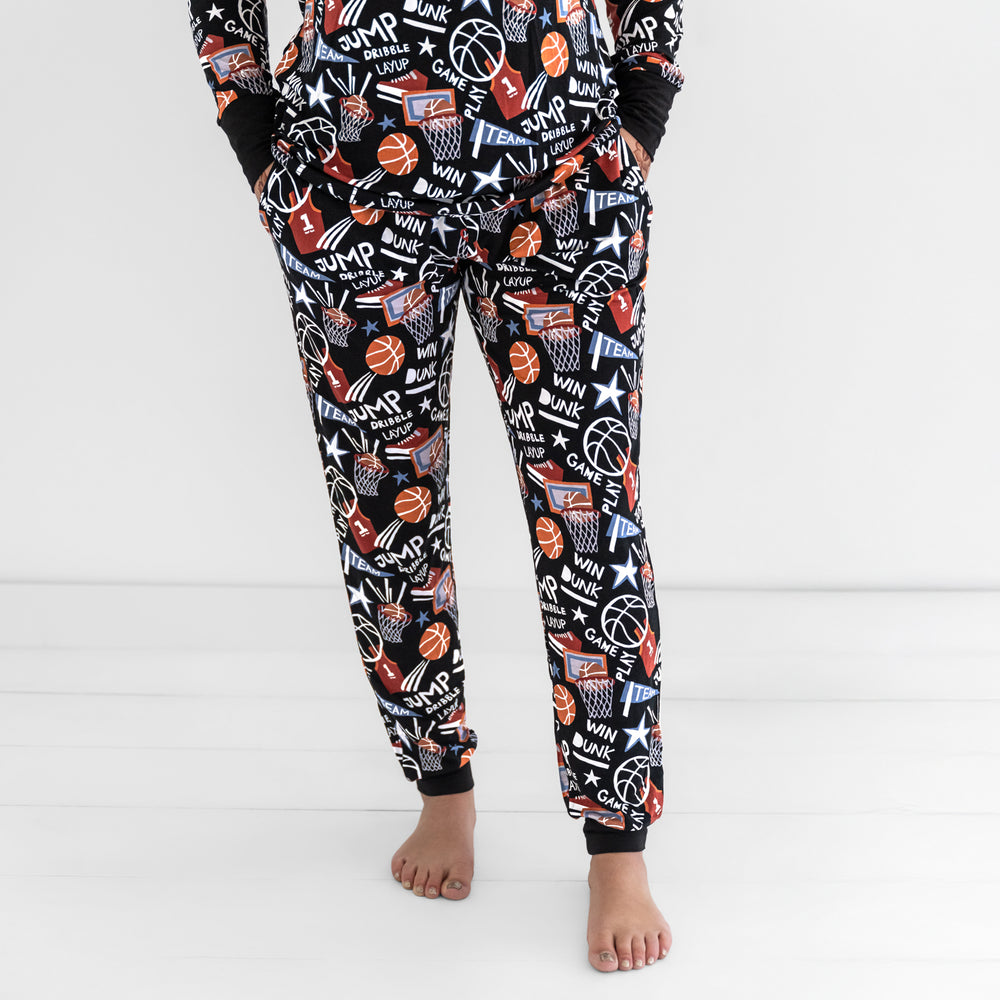Front view of a woman wearing the Black Slam Dunk bamboo pajama pants