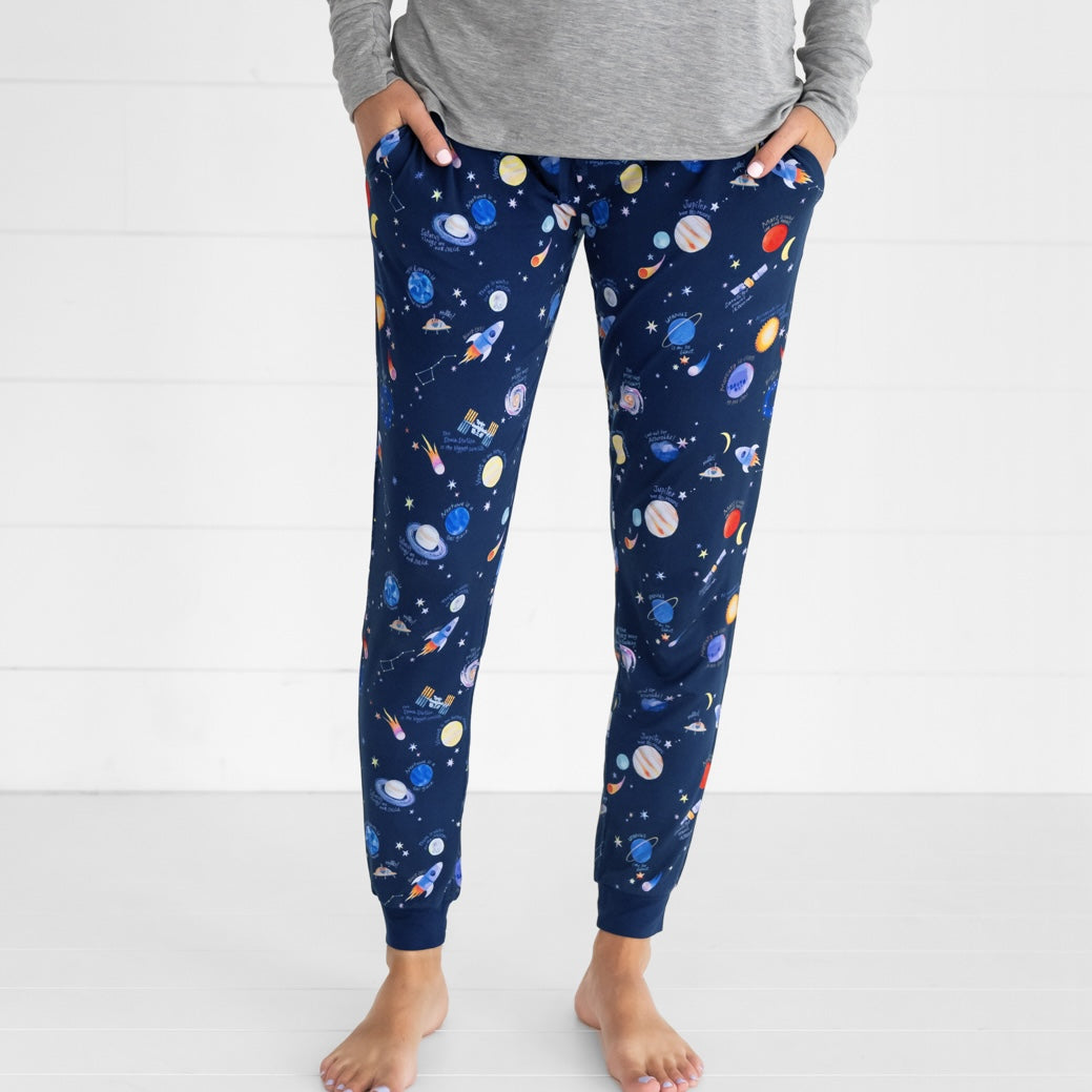 Close up image of a woman wearing a pair of Through My Telescope women's pj pants