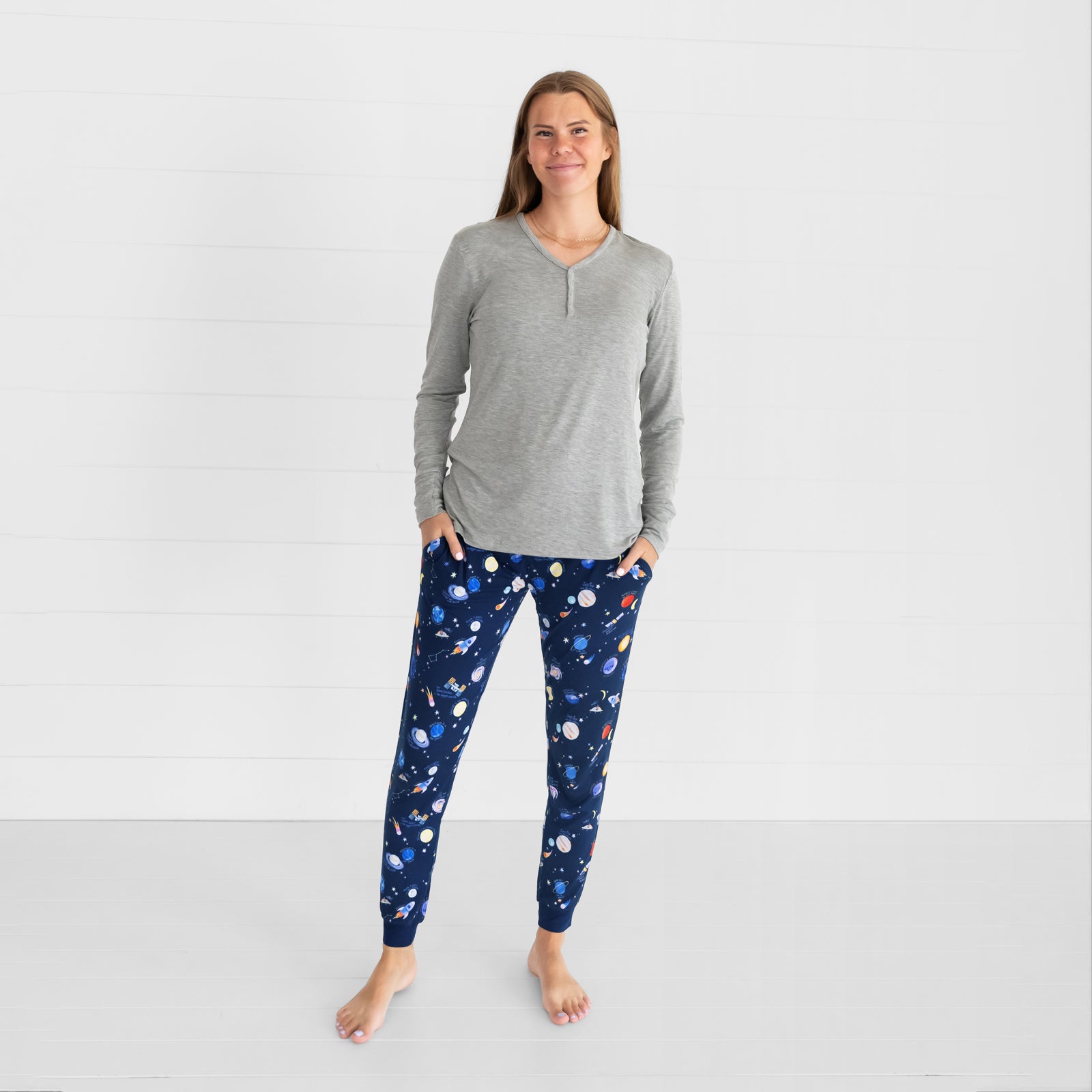 Image of a woman wearing Through My Telescope women's pj pants and women's Heather Gray pj top