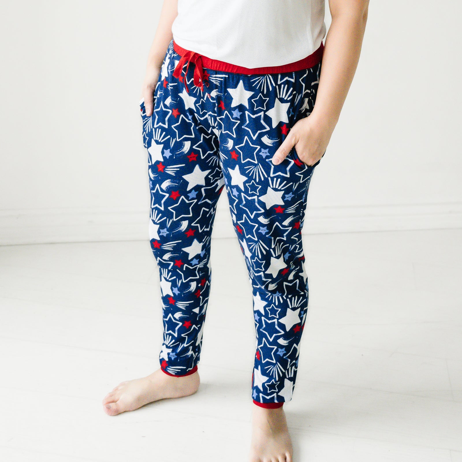 Close up image of a woman wearing Star Spangled women's pajama pants