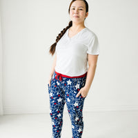 Woman wearing Star Spangled women's pj pants paired with a women's Bright White pj top
