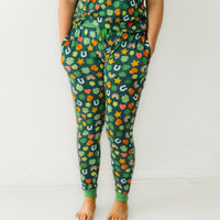 Close up image of a woman wearing Lucky printed women's pajama pants