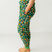Profile close up image of a woman wearing Lucky printed women's pajama pants