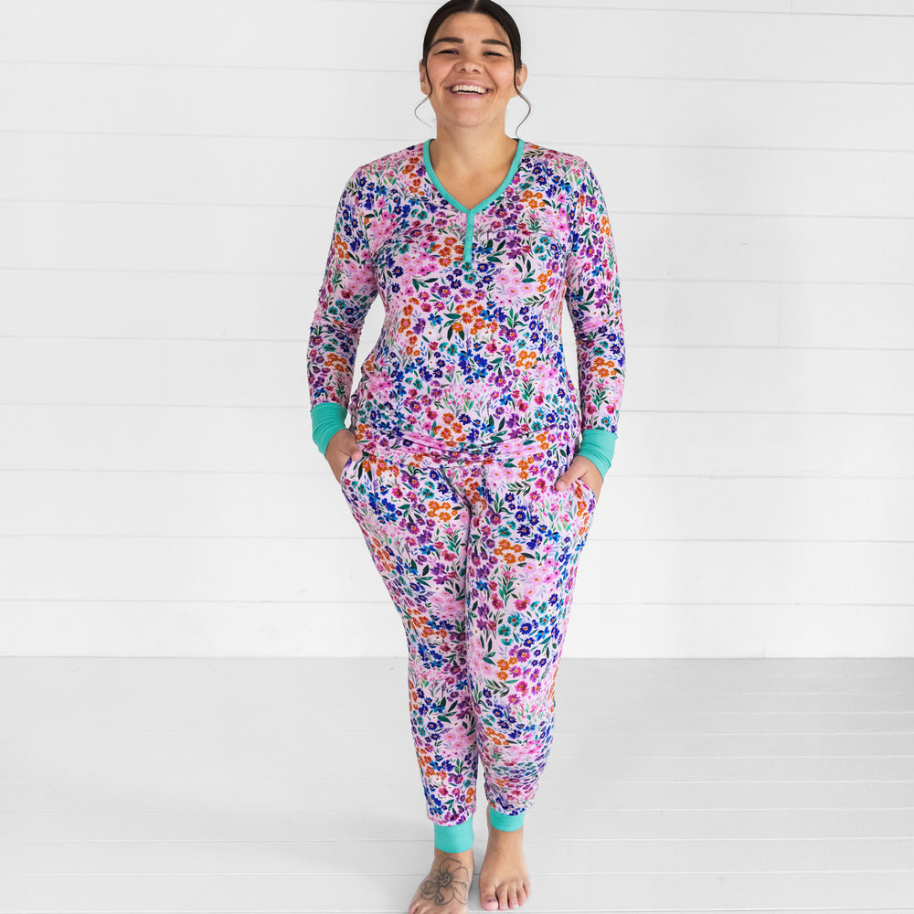 Image of a woman wearing Sweet Pea Floral women's pj pants and a matching women's pj top