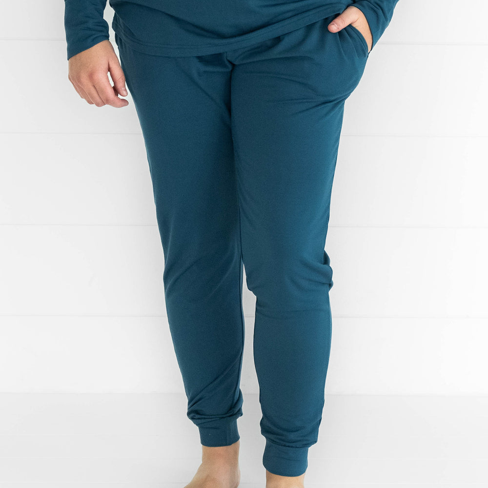 Close up image of a woman wearing Cozy Twilight Teal women's pj pants