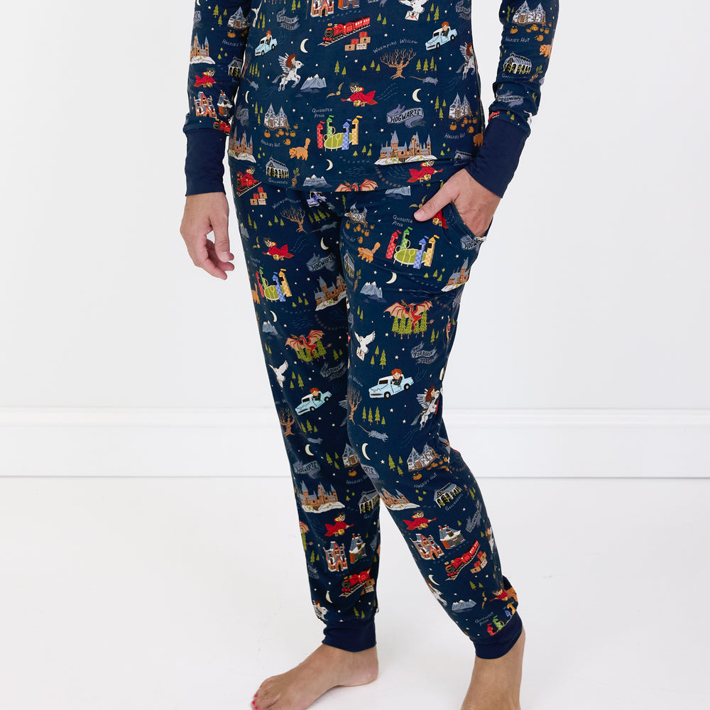 Close up image of a woman wearing An Evening at Hogwarts printed women's pj pants