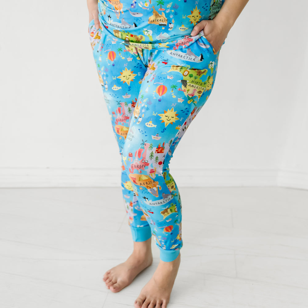Close up image of a woman wearing Around the World women's pajama pants