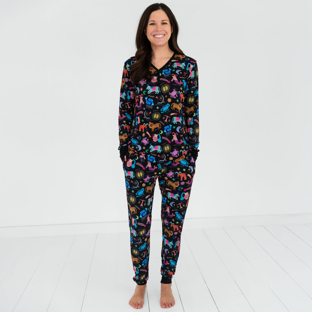 Image of a woman wearing Star Signs women's pj pants and a matching women's pj top