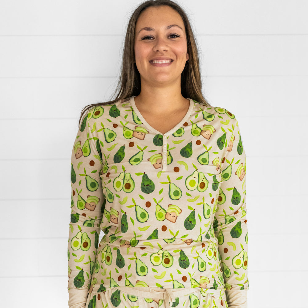 Close up image of a woman wearing Avocado Toast pj top