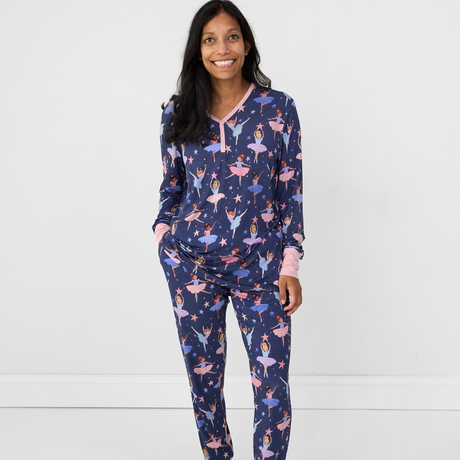 Image of a woman wearing women's Twilight Ballet pj top and women's pj pants