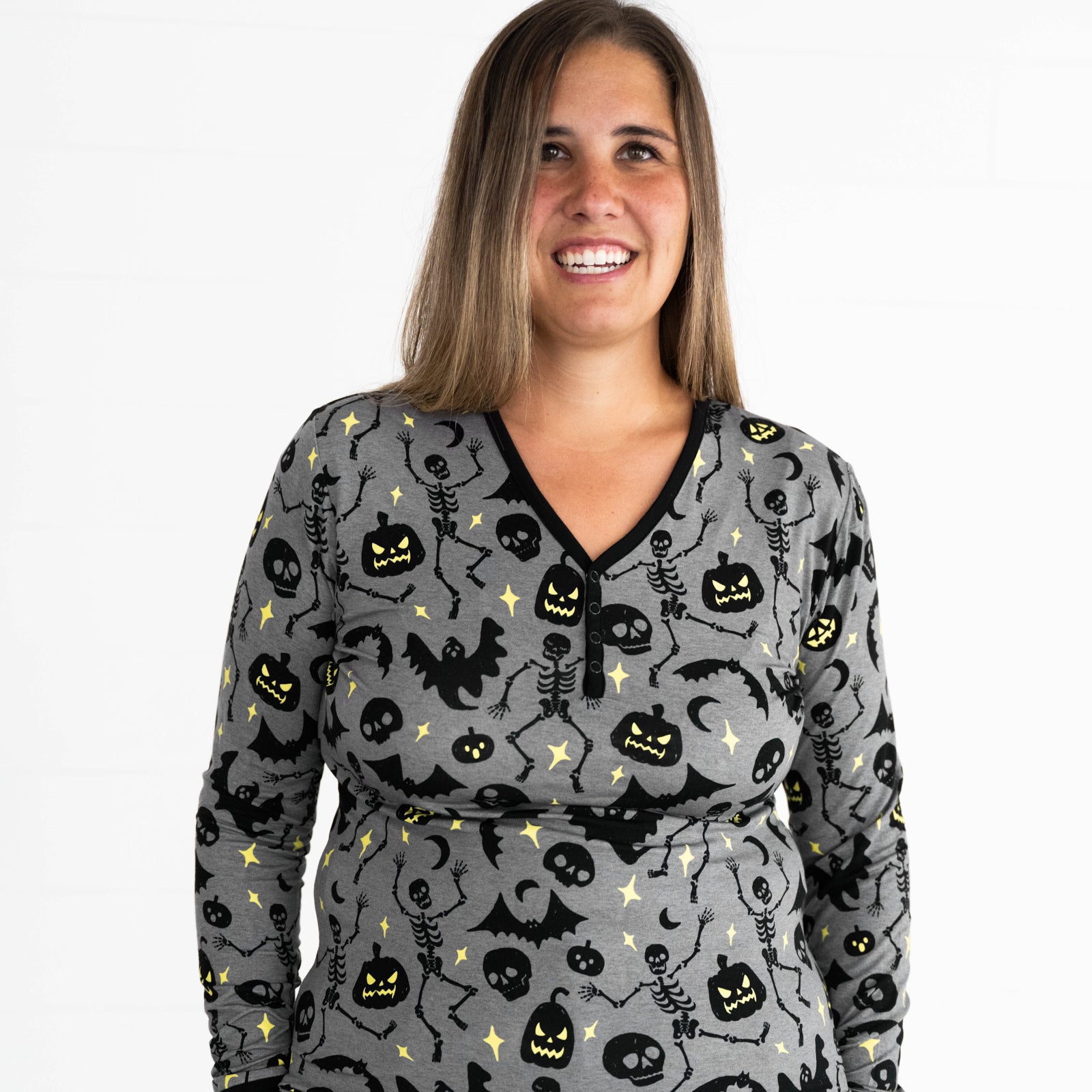 Close up image of female model in the Gray Glowing Ghouls Women's Pajama Top