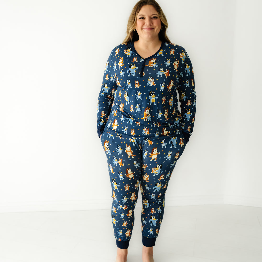 Women wearing a Bluey Dance Mode women's pajama top paired with matching women's pajama pants