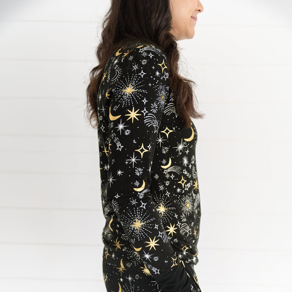 Close up profile image of a woman wearing a Celebration Stars women's pj top