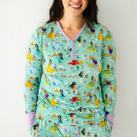 Close up image of a woman wearing a Disney Princess Dreams women's pajama top