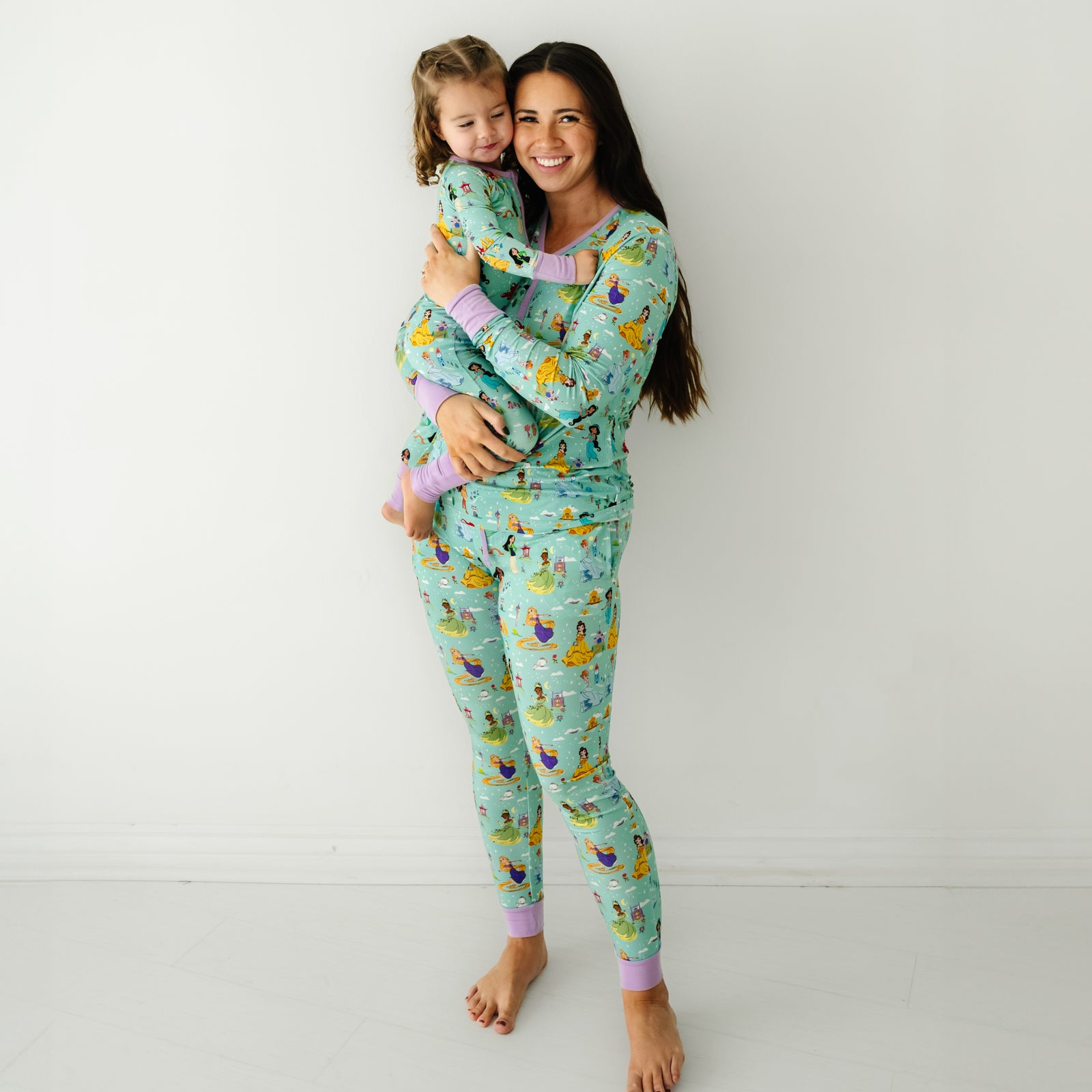 Mother and child wearing matching Disney Princess Dreams pajamas