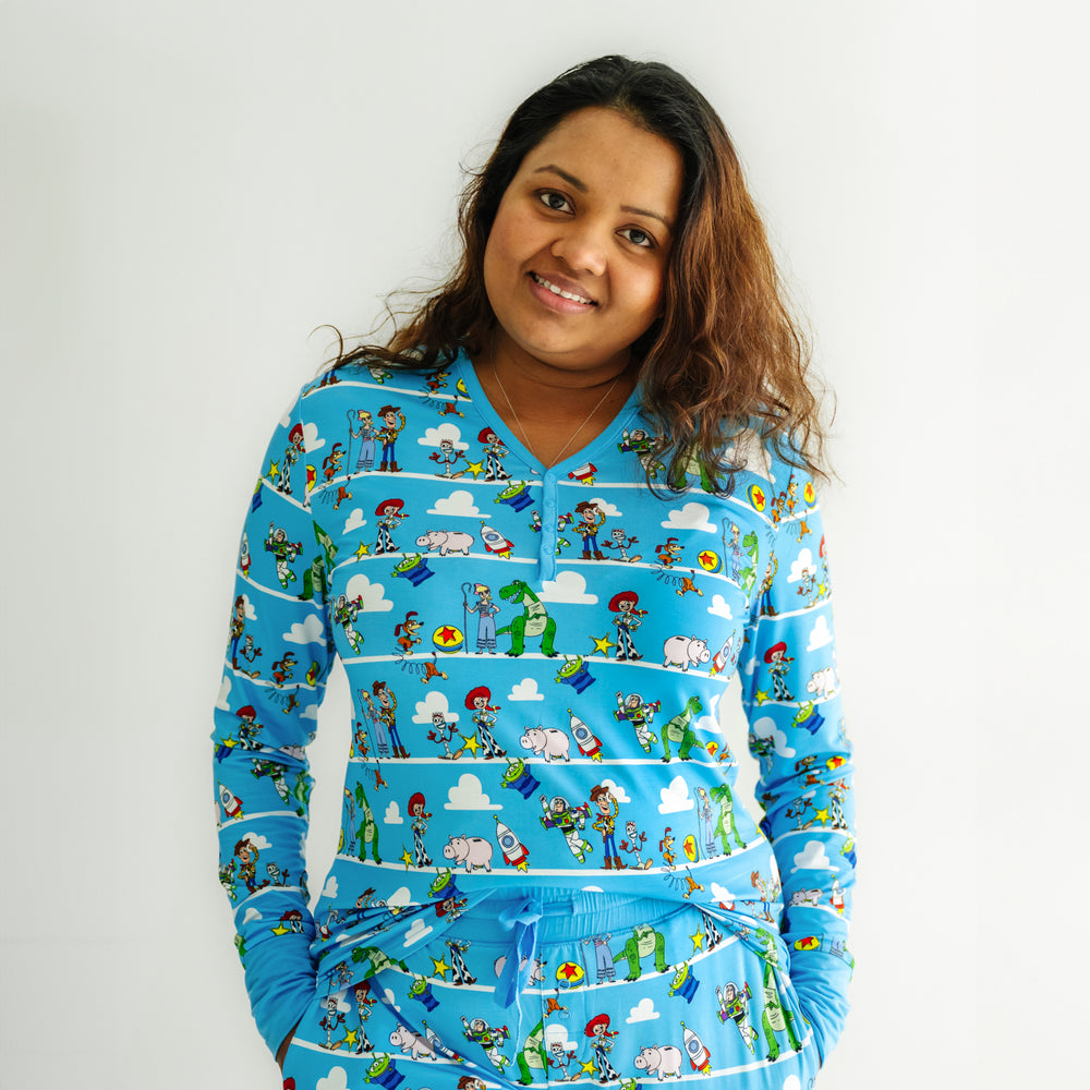 Click to see full screen - Close up image of a woman wearing a Disney Pixar Toy Story Pals women's pajama top