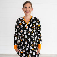 Close up image of female model wearing the Friendly Ghosts Women's Pajama Top