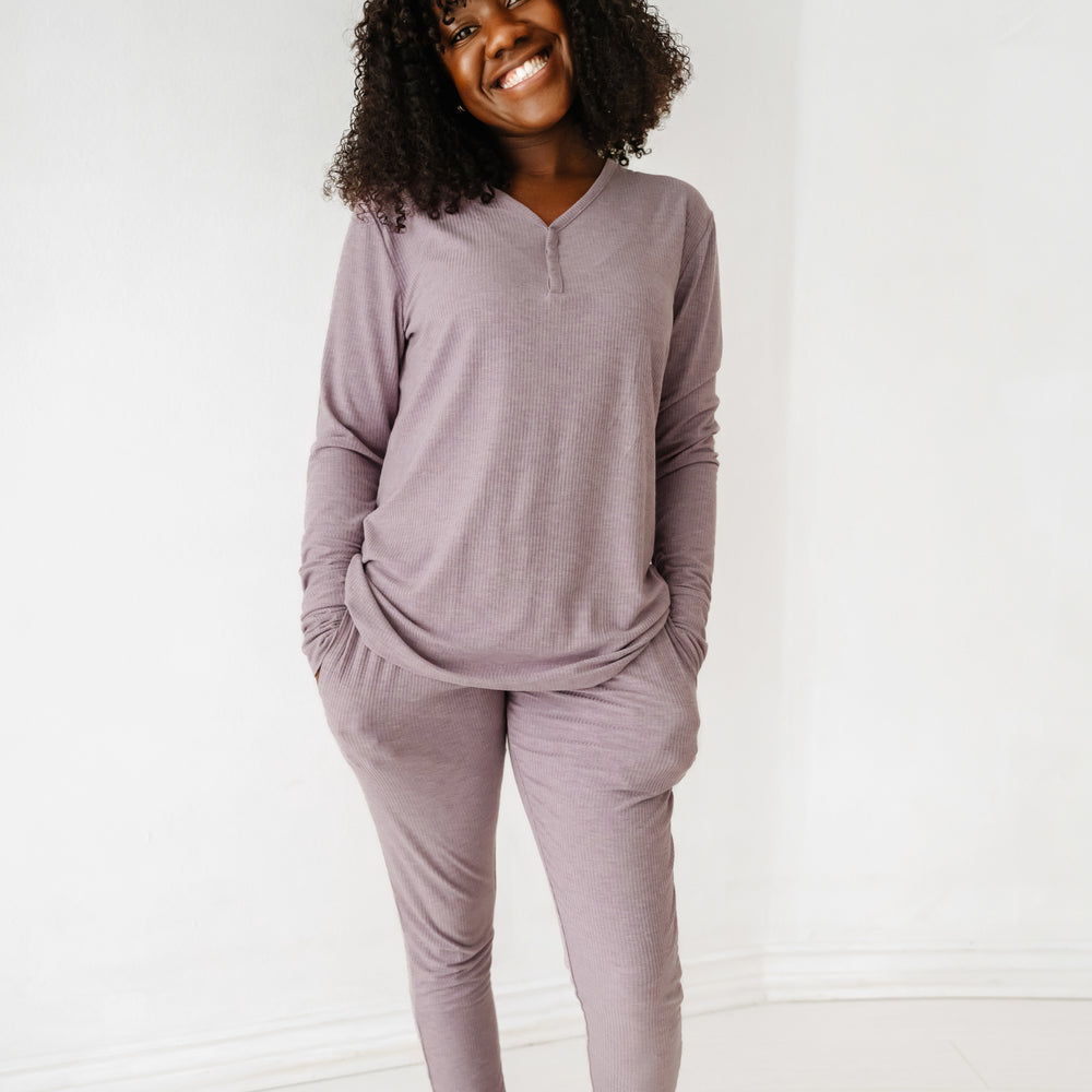 Woman wearing women's Heather Smokey Lavender pajama top and matching women's pajama pants