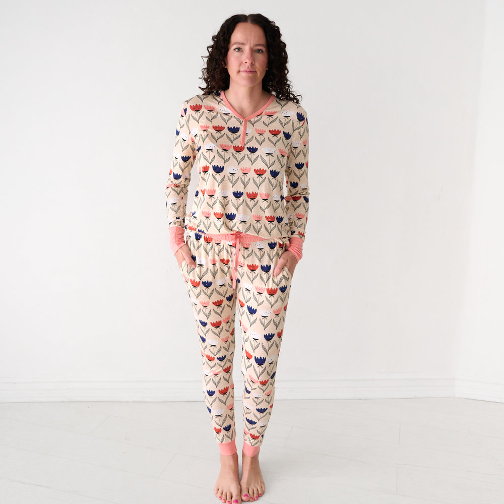 Woman wearing Flower Friends women's pajama pants and matching top