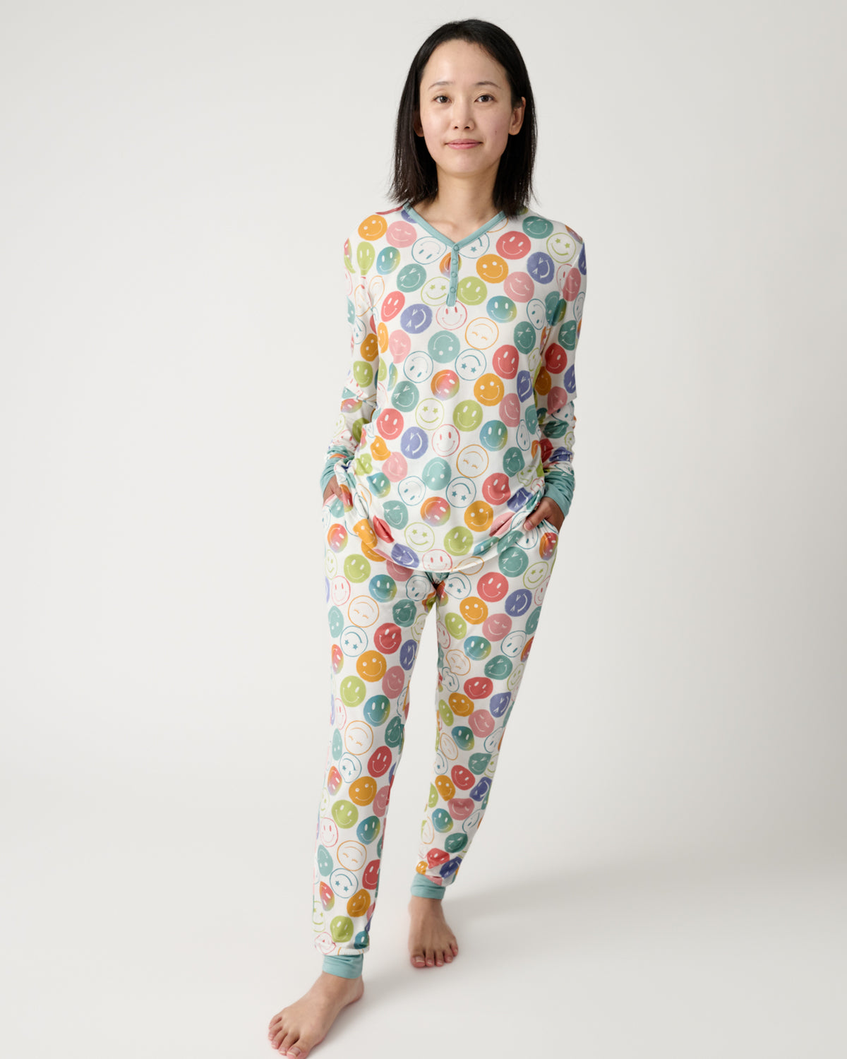 Woman wearing the Positive Vibes Women's Pajama Pants and Top