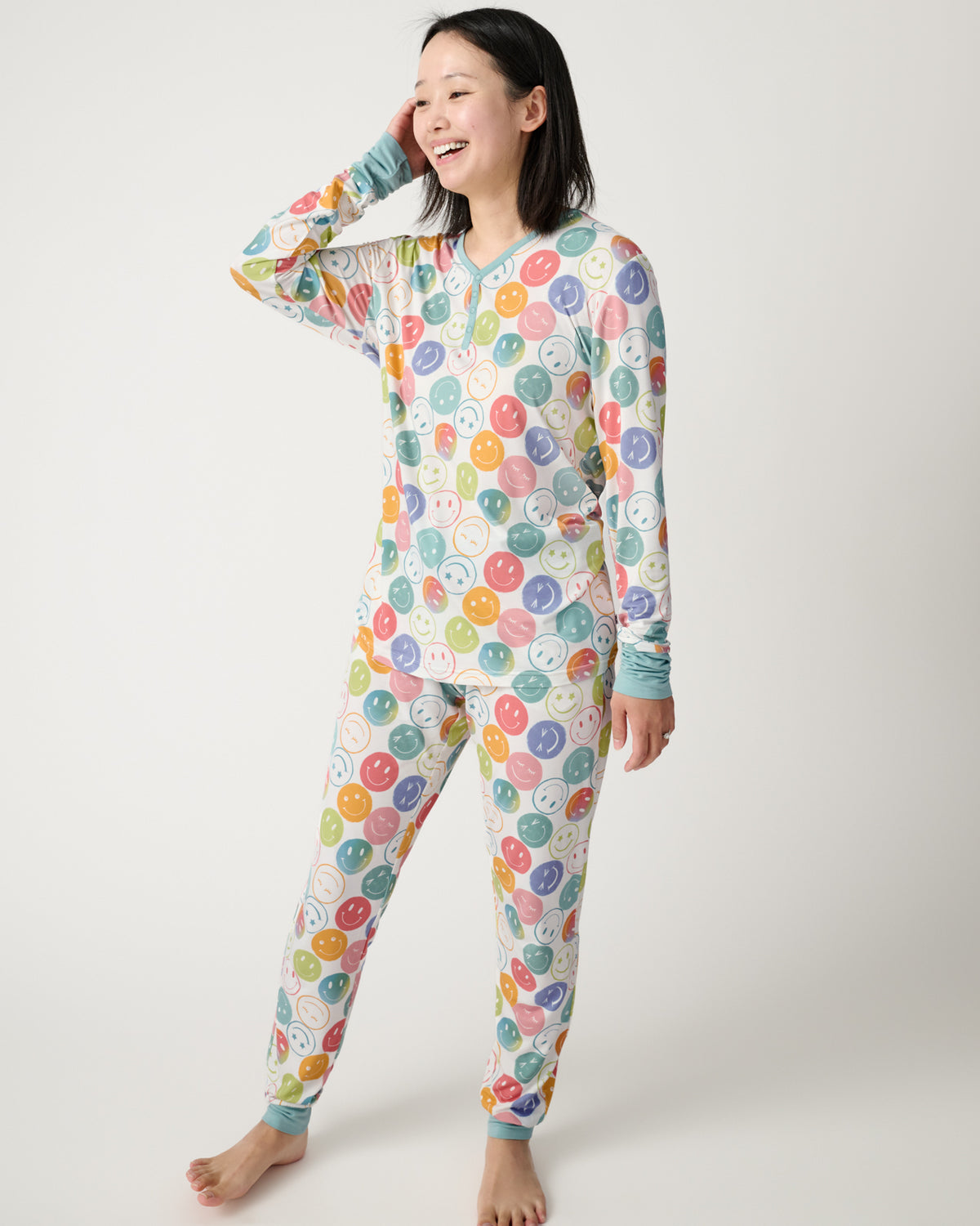 Woman wearing the Positive Vibes Women's Long Sleeve Pajama Top and Pants