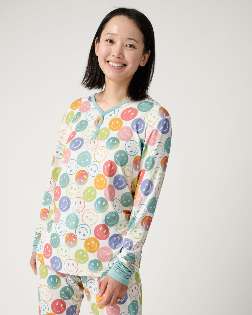 Woman wearing the Positive Vibes Women's Long Sleeve Pajama Top