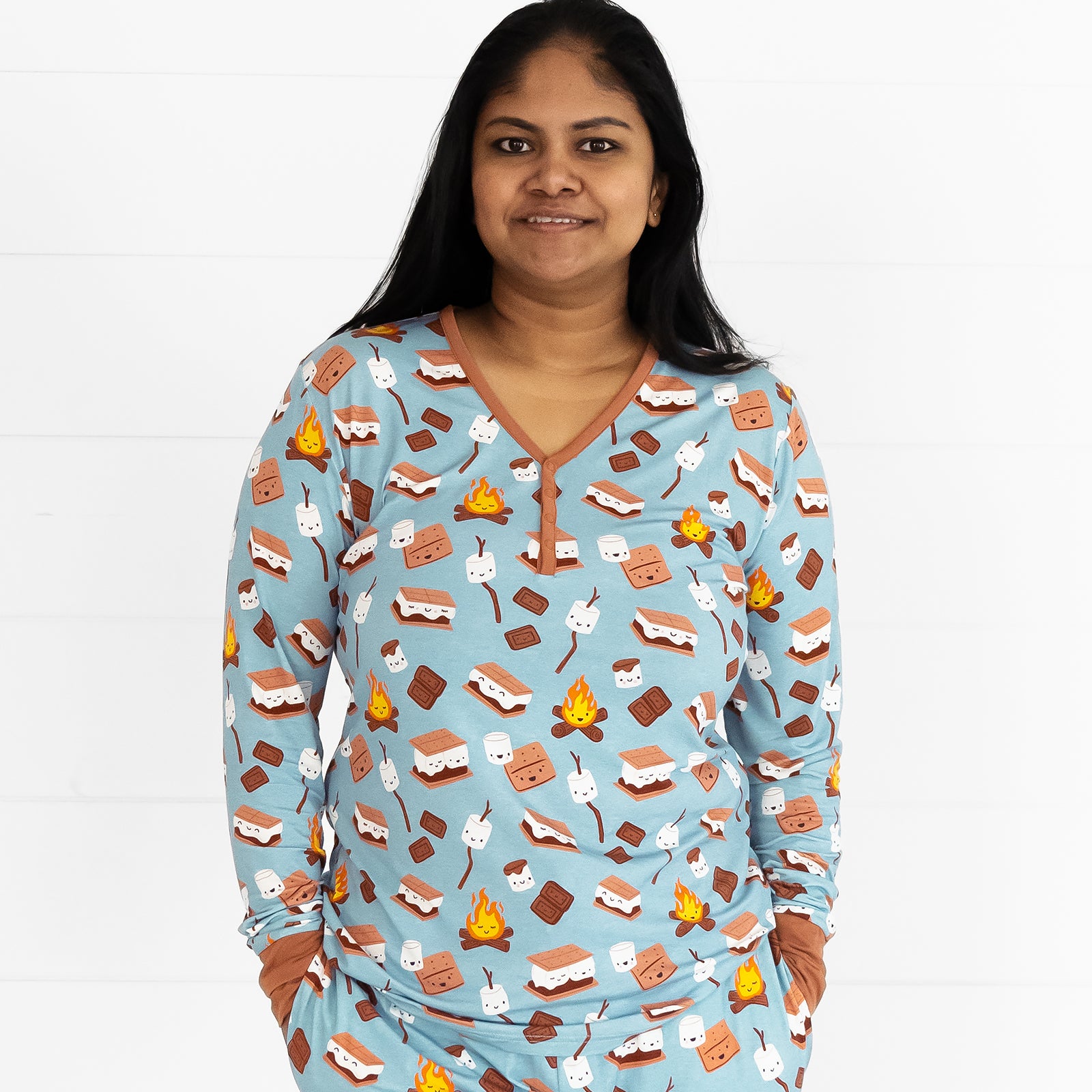 Close up image of a woman wearing a S'mores Galore women's pj top