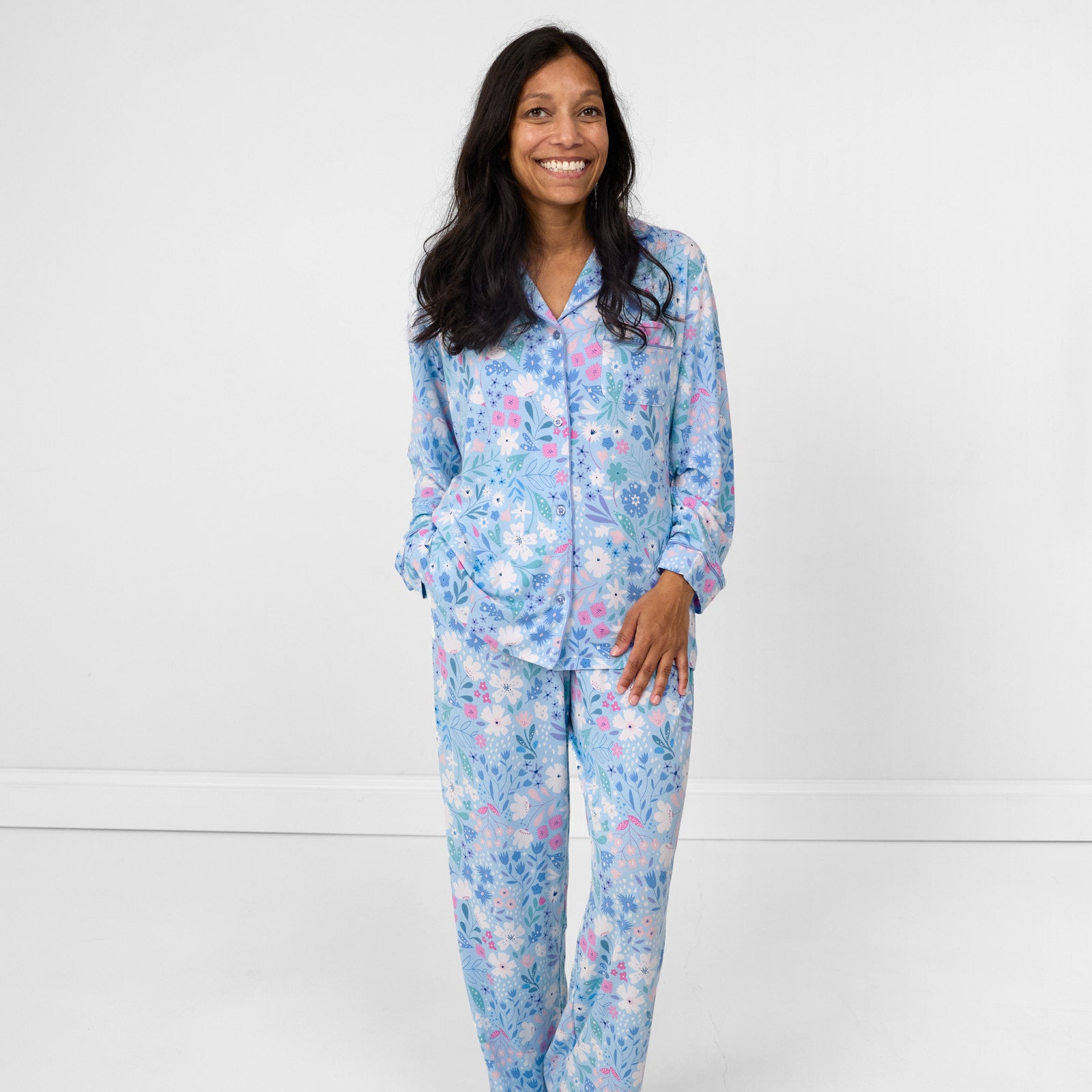 Alternate image of a woman posing wearing a two piece women's Magical Meadow pj set