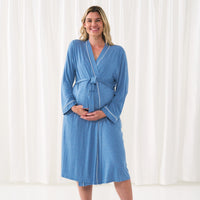 woman posing wearing a Women's Robe in Heather Blue