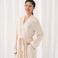 close up image of a woman posing wearing a Heather Oatmeal women's robe