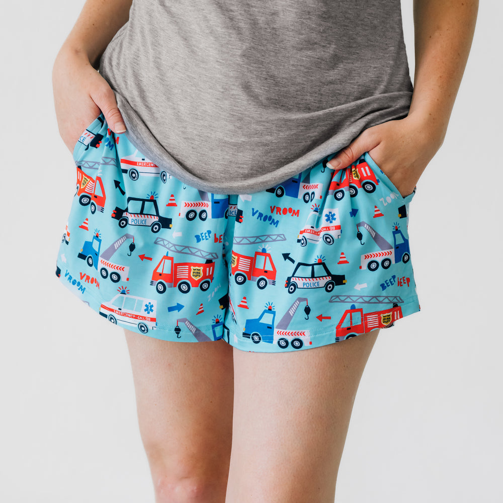 Close up image of a woman wearing To The Rescue women's pj shorts
