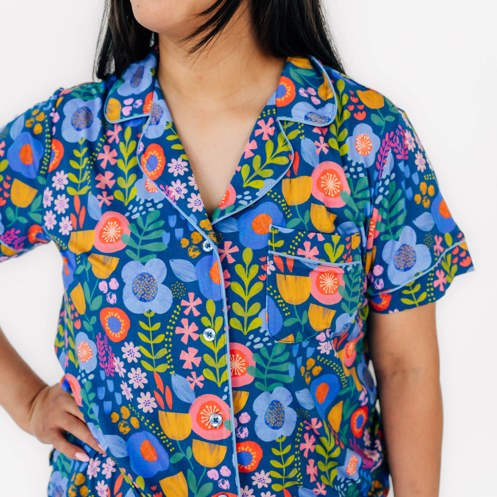 Close up image of woman wearing the top included in the Folk Floral Women's Short Sleeve Pajama Set