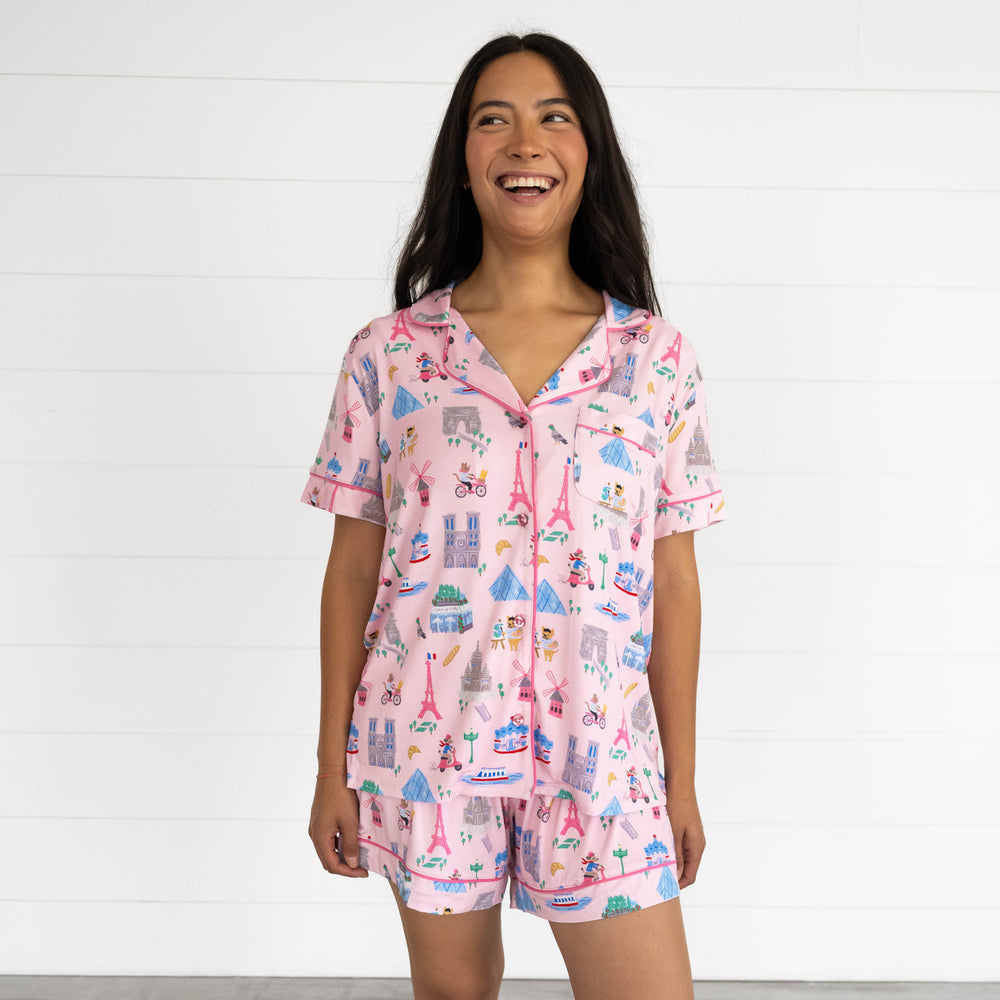 Female smiling while wearing the Pink Weekend in Paris Women's Short Sleeve & Shorts Pajama Set