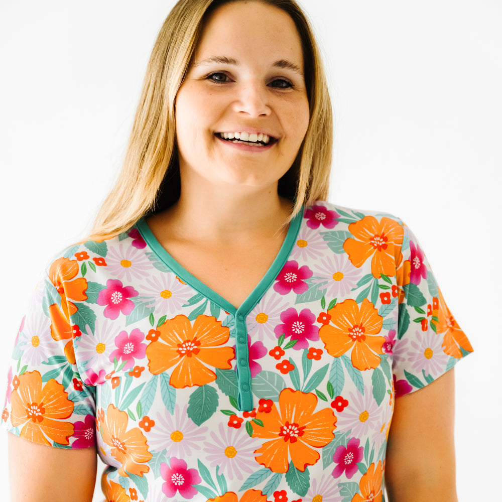 Close up image of a woman wearing Beachy Blooms printed women's pajama top