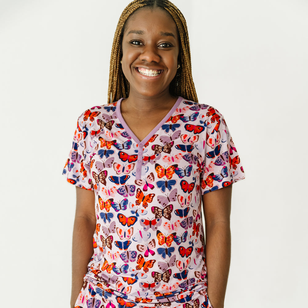 Close up image of a woman wearing a Butterfly Kisses women's short sleeve pajama top