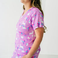 Close up profile image of a woman wearing a Magical Birthday women's pj top