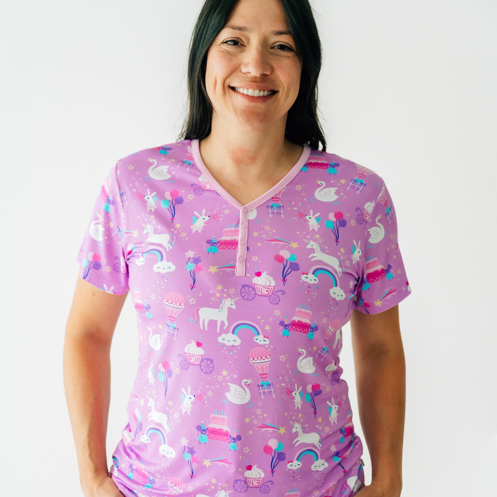 Close up image of a woman wearing a Magical Birthday women's pj top