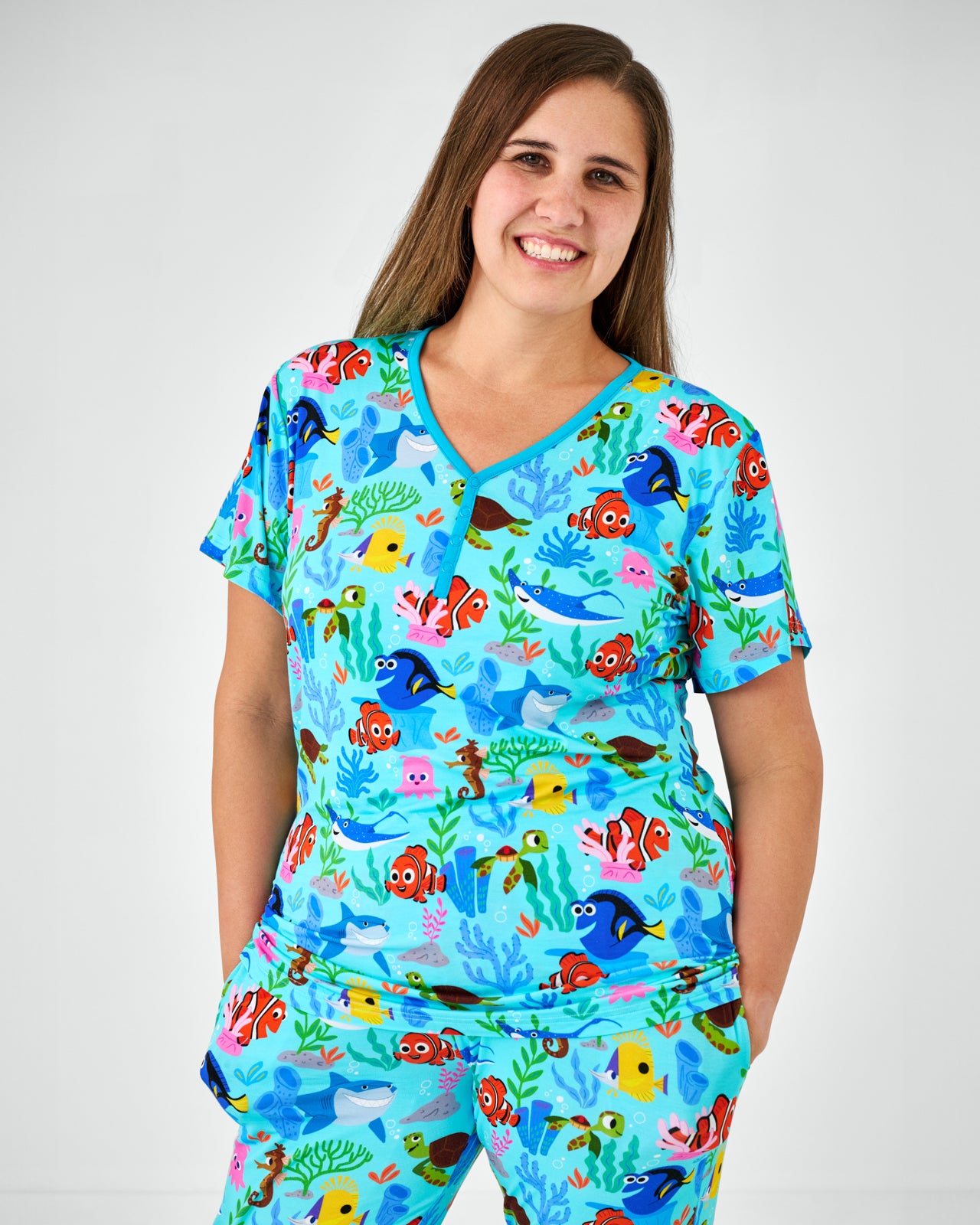 Woman wearing the Disney Nemo's Reef Women's Short Sleeve Pajama Top