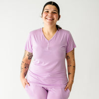 Close up image of a woman wearing a Light Orchid women's pajama top
