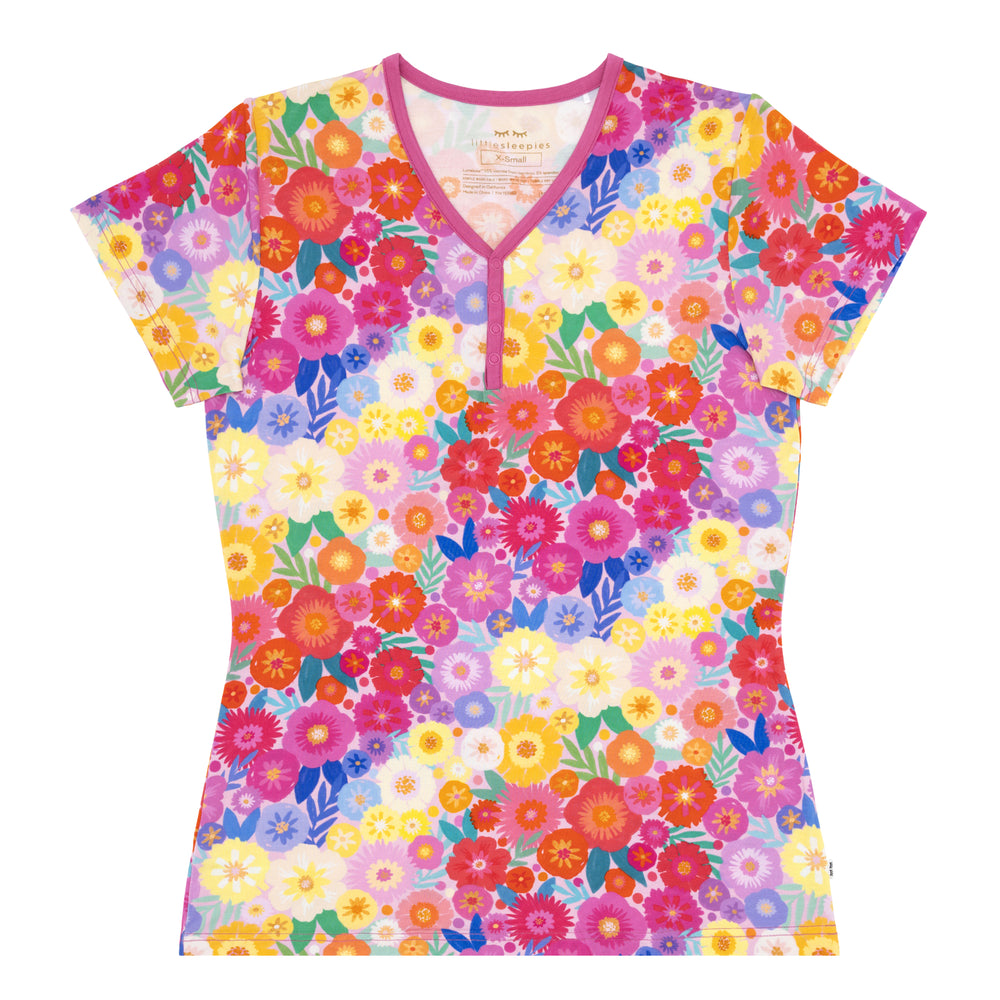 Flat lay image of a Rainbow Blooms women's short sleeve pajama top