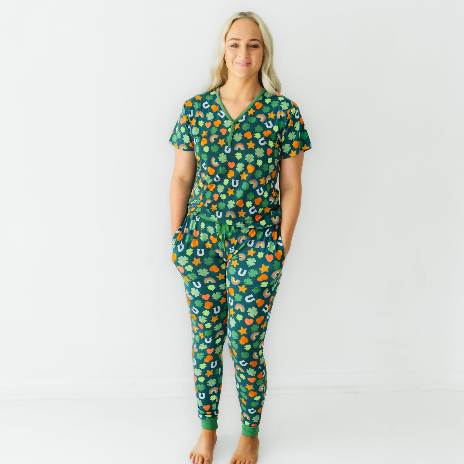 Woman wearing a women's Lucky printed pajama top and matching pajama pants