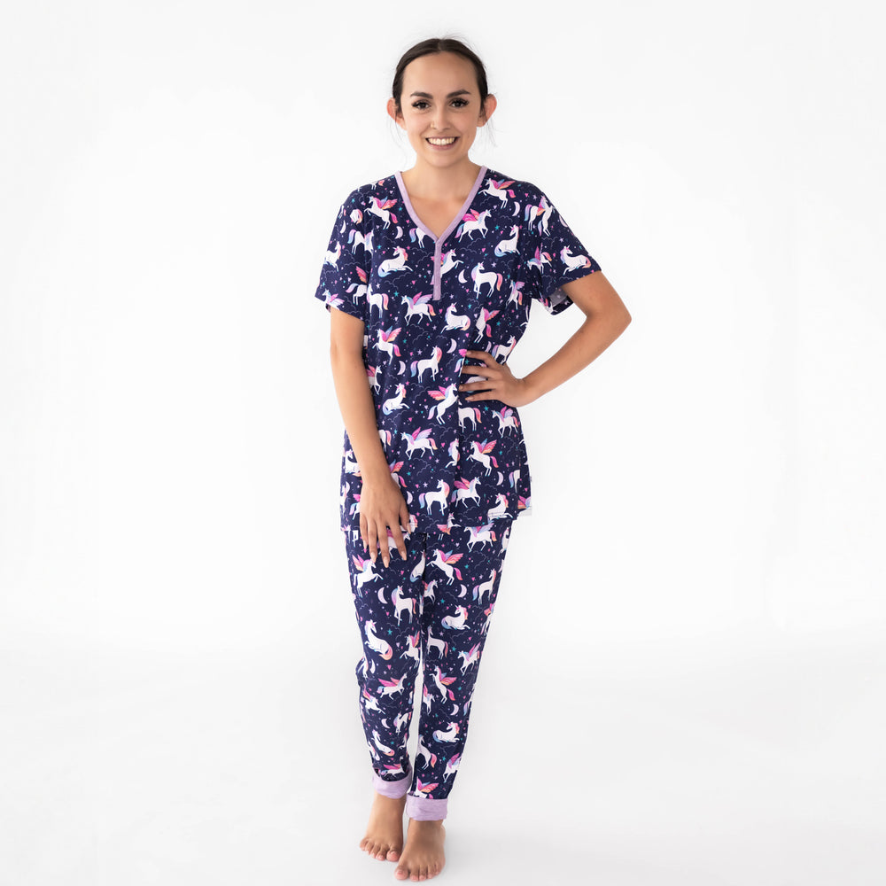 Full body image of woman wearing the Magical Skies Women's Short Sleeve Pajama Top and Magical Skies Women's Pajama Pants