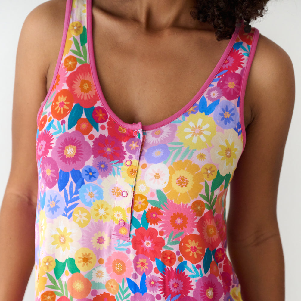 Close up image of a woman wearing a Rainbow Blooms women's tank nightgown