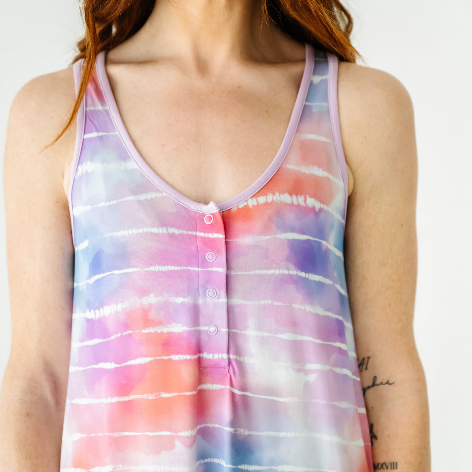 Close up image of a woman wearing a Pastel Tie Dye Dreams women's sleeveless nightgown