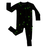 Flat lay image of the glow in the dark effect on a Gray Glowing Ghouls Zippy