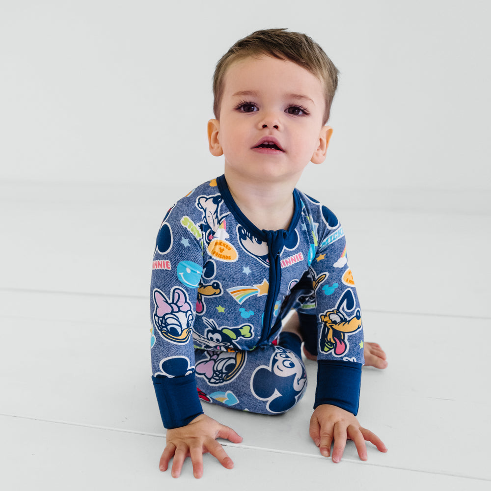 Crawling child wearing Navy Disney Mickey's Clubhouse bamboo pajamas