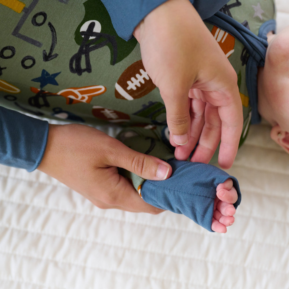 Close up image of the fold over hand detail on the touchdown-time-zippy